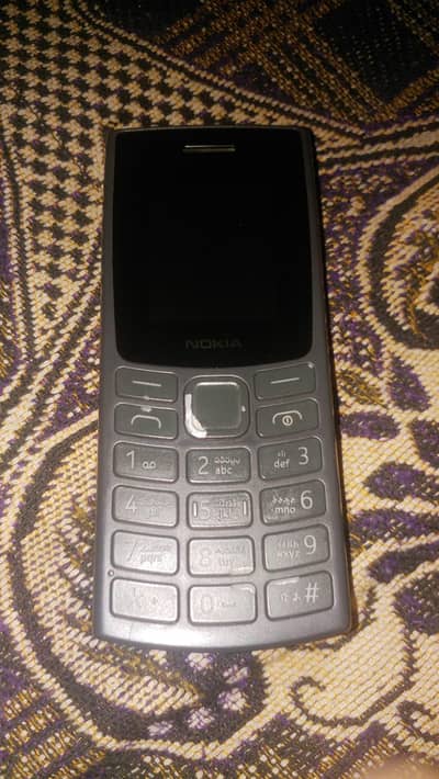 Nokia 106 with box and charger