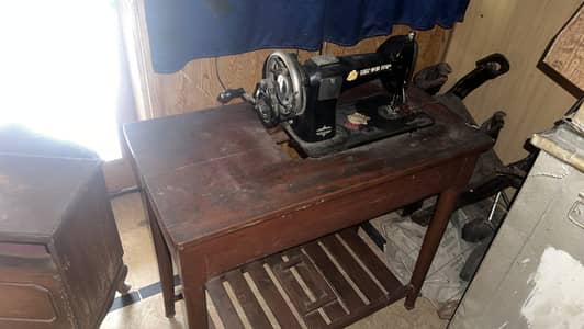 Sewing machine with cover