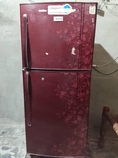 National medium size refrigerator excellent condition fully working