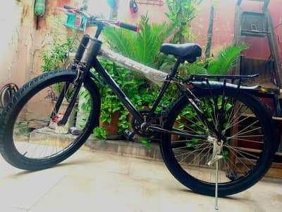 Mountain Bicycle with Italian Helmet thick tyres – Excellent Condition