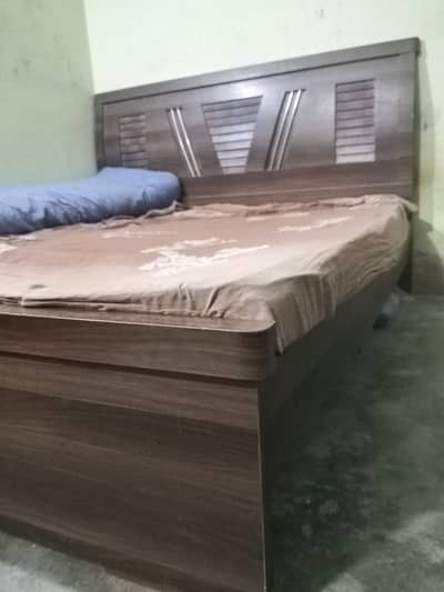 Wooden double bed