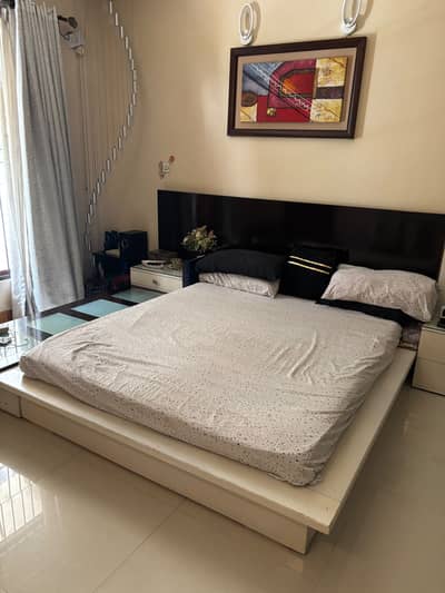 White bed in deco with side tables