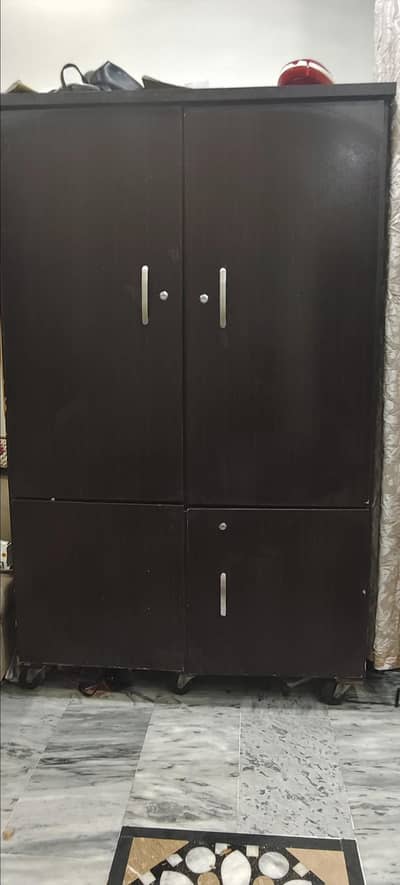 4 door wardrobe for sale with 04 shelf in excellent condition .