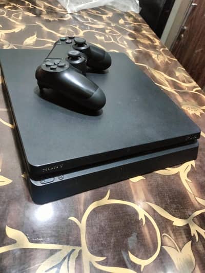 PS4 slim 500gb for sale with 4 games