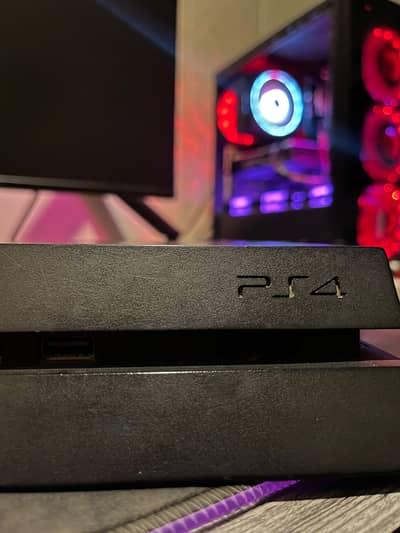 playstation 4 + 2 controllers - used - offer with 2 discs - 9/10