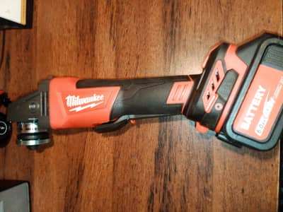 Milwaukee Cordless Angle Grinder and Drill