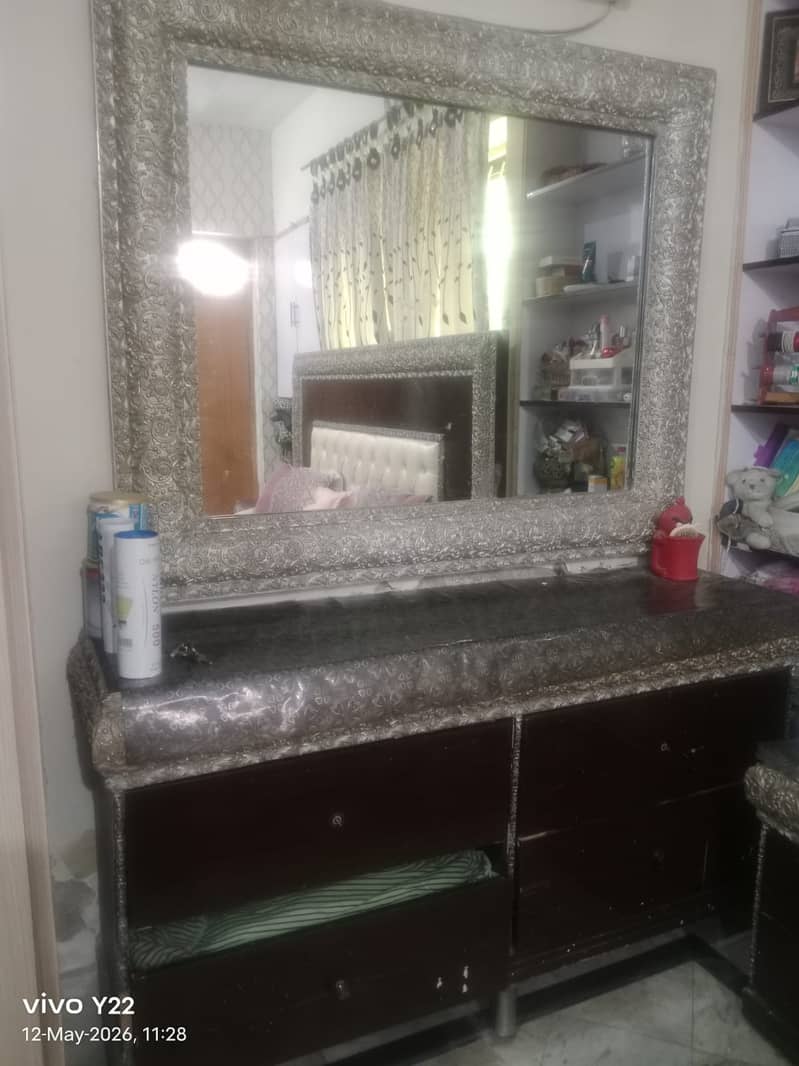Double bed, side tables and dressing table. 1