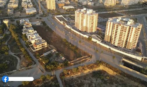 MAIN 150FIT ROAD SECTOR U NEAR BIN HASHIM APPOSIT PHA TOWER BEST LOCATION PLOT FOR SALE