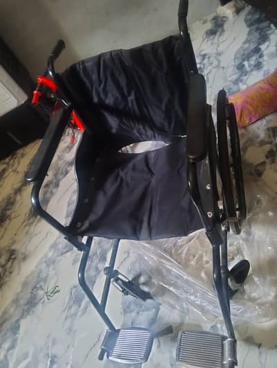 Brand New Wheel chair for sale urgent 23000 ki le thi weight kafi ha