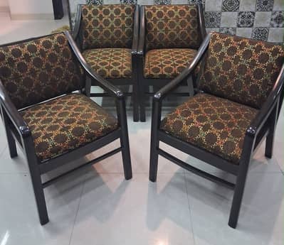 Four Chairs And One Table