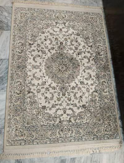 Rug for sale (beige color) ,Used but in Good Condition