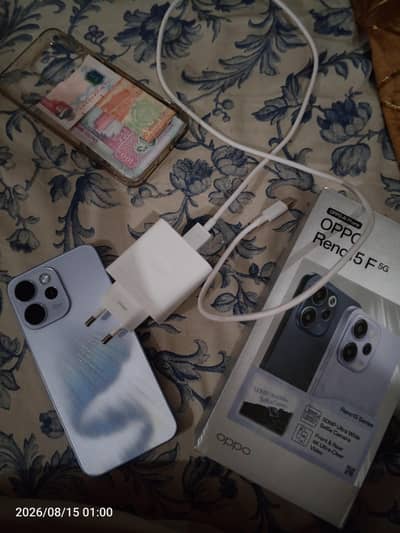 OPPO Reno 15. F 8.256 1 month used With BoX ANd original Charger .