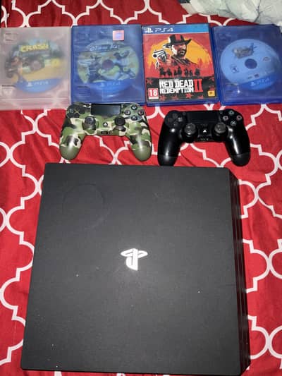 PS4 Pro 1TB + 2 Wireless Controllers + 19 Games | Excellent Condition