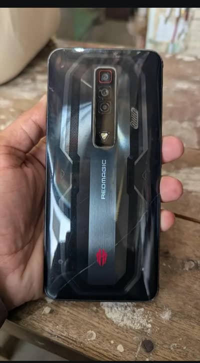 Red magic 7 12/128 with box and charger
