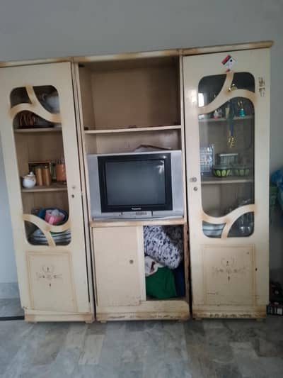 2 almari ha aik tv rakhne ka ha or aik dressing table ha