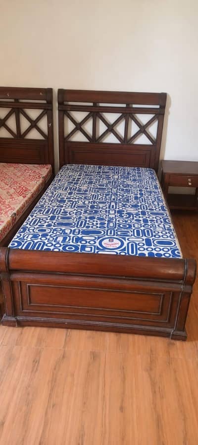 single wooden beds  for sale urgently