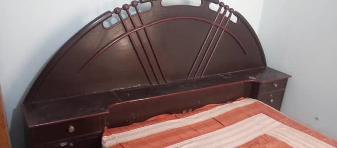 wooden double bed