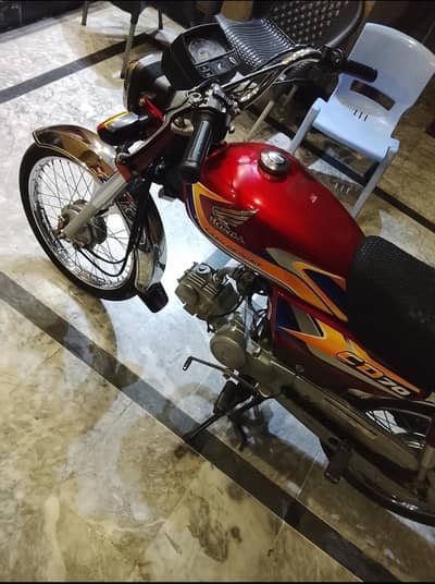 Honda Cd 70 red colour