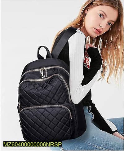 Black quilted nylon school back pack for girls