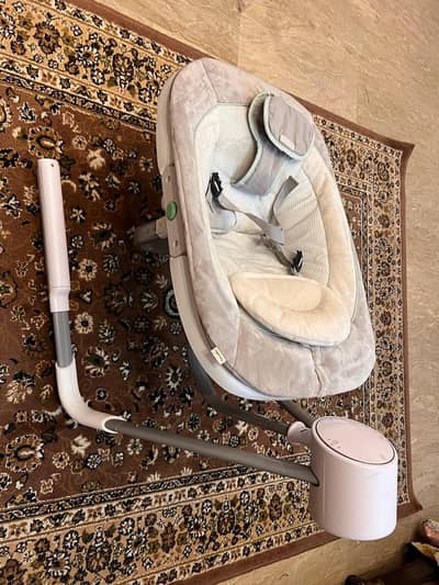 Ingenuity baby bouncer rotatable and with dual battery and wired music