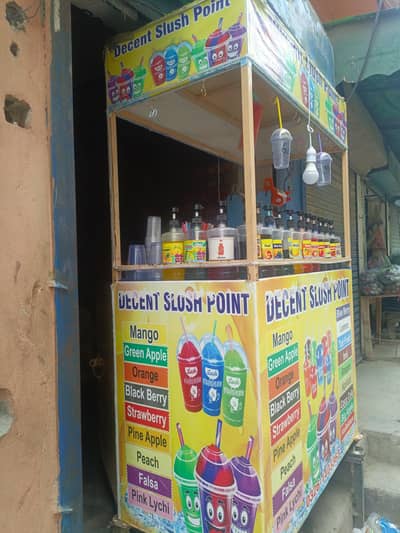 slush Machine cup seller machine and counter all setup for sall
