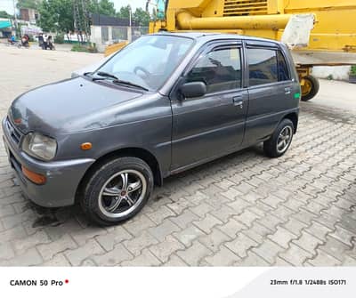 03295811869.  Daihatsu Cuore 2009