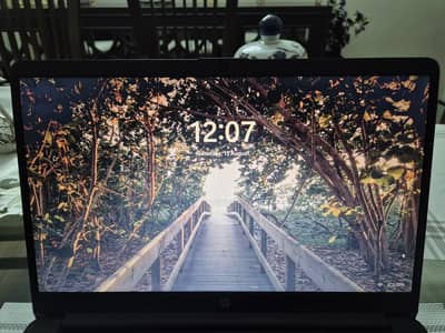 Hp Core i3 12th gen, 12 GB RAM, 256 GB SSD Storage.
