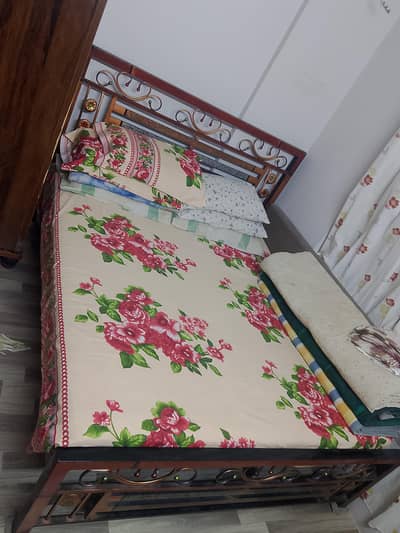Metal double bed with Mattress (no pillows)