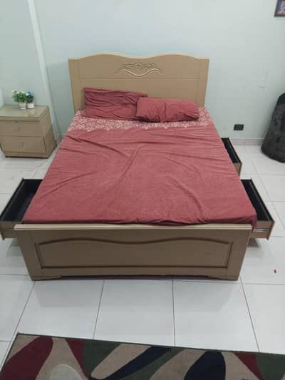 Double bed including mattress and side tables