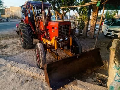 Belarus 1984 Model Tractor for sale + Front Blade and Chisel Plough.