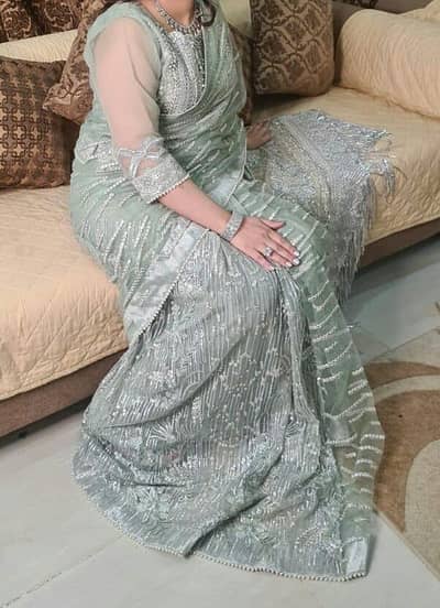 Sari  light green colour  ( brand  MushQ