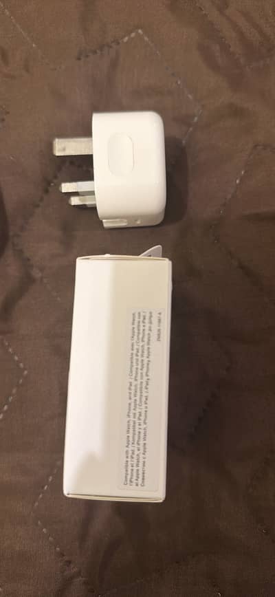 Almost brand new 20W three pin charger with 60W cable
