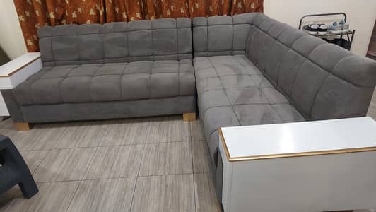 L Shaped grey sofa