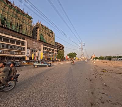 PRIME LOCATION 400 SQUARE YARD COMMERCIAL S. B MAIN 184 WIDE ROAD PLOT FOR SALE IN CUSTOM SOCIETY SECTOR 52-A KARACHI