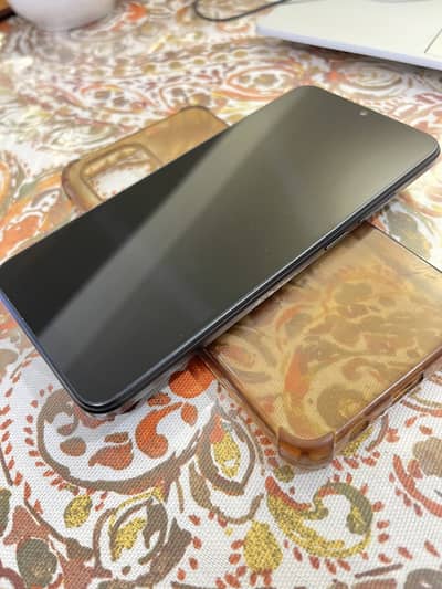 Selling Redmi A2+ In Great condition, with original charger