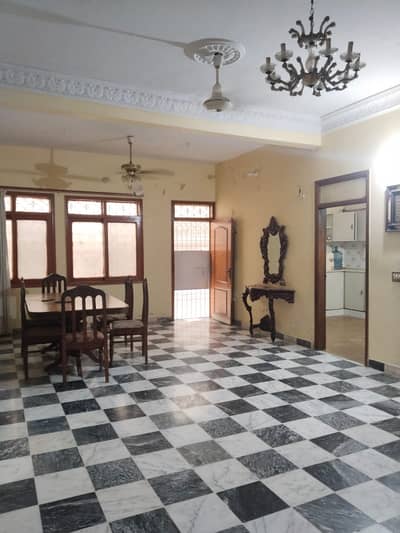 300 YARDS BUNGALOW IN BLOCK 4 AVAILABLE FOR SALE in commercial area