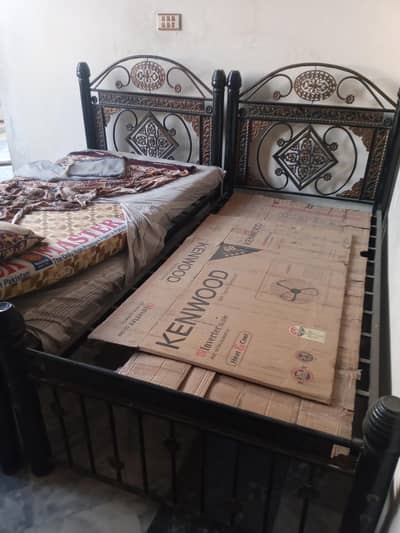 2 single iron beds