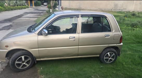 Daihatsu Cuore 2011 automatic total original,660cc engion