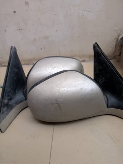 Swift and wagonr genuine side mirror
