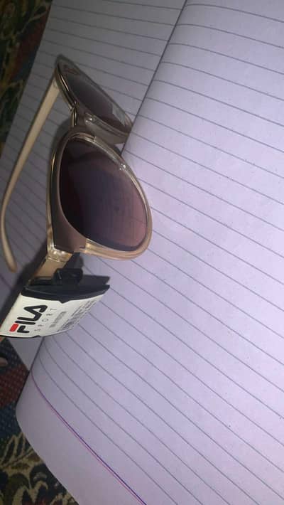 “FILA Sport Sunglasses – 100% UV Protection”