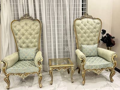 2 Royal style chairs and a table
