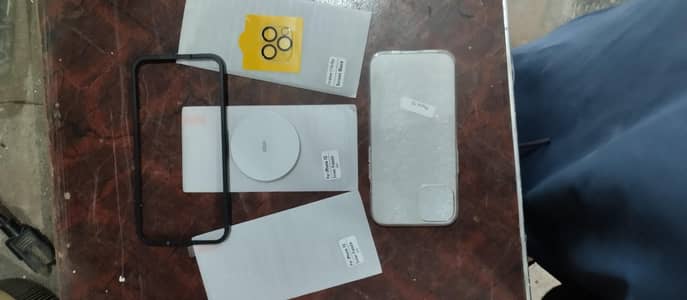 Accessories for iPhone 13 including ESR wireless charger