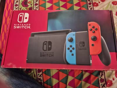 Nintendo Switch V2 with box