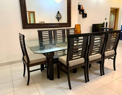 Luxury 8-Seater Glass Top Dining Table  Rs. 80,000 Excellent condition