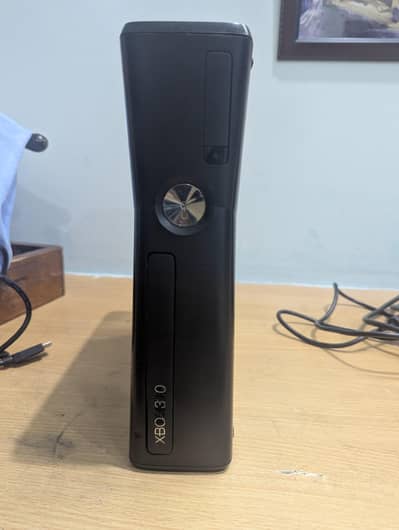 Xbox 360 slim with two wireless controllers