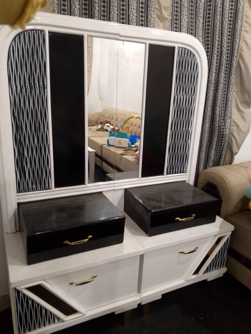 white colour used bed set dressing table side table. 2