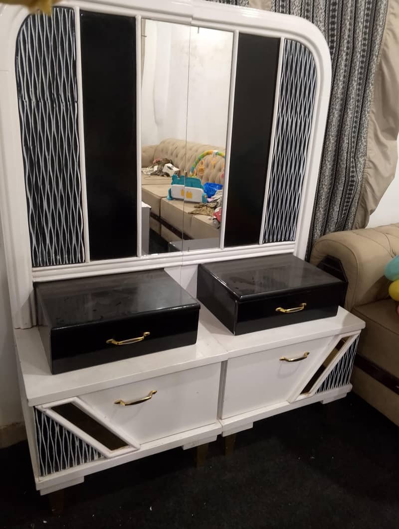 white colour used bed set dressing table side table. 3