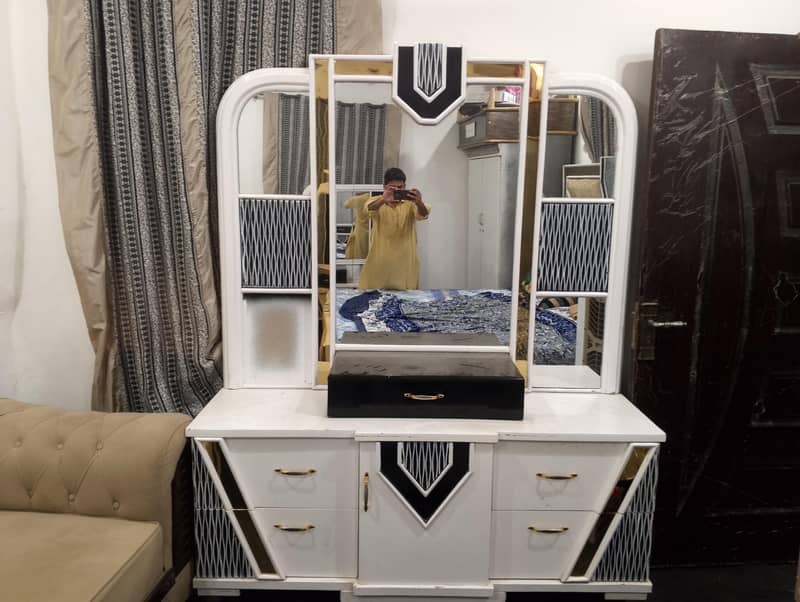 white colour used bed set dressing table side table. 4