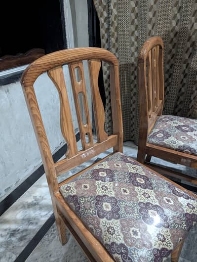 Dinning table with four chairs.