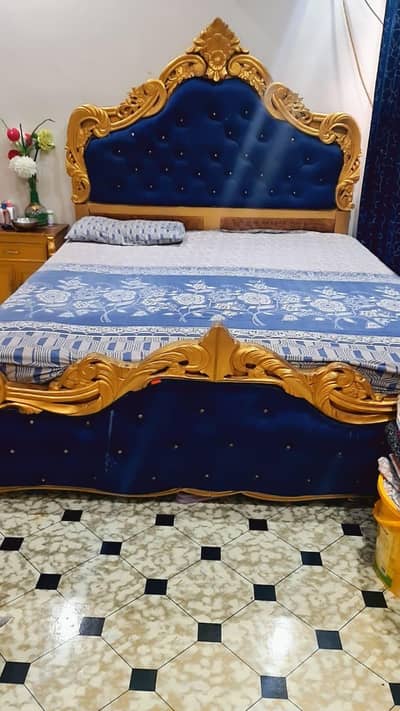 king size bed with two side tables for sale.